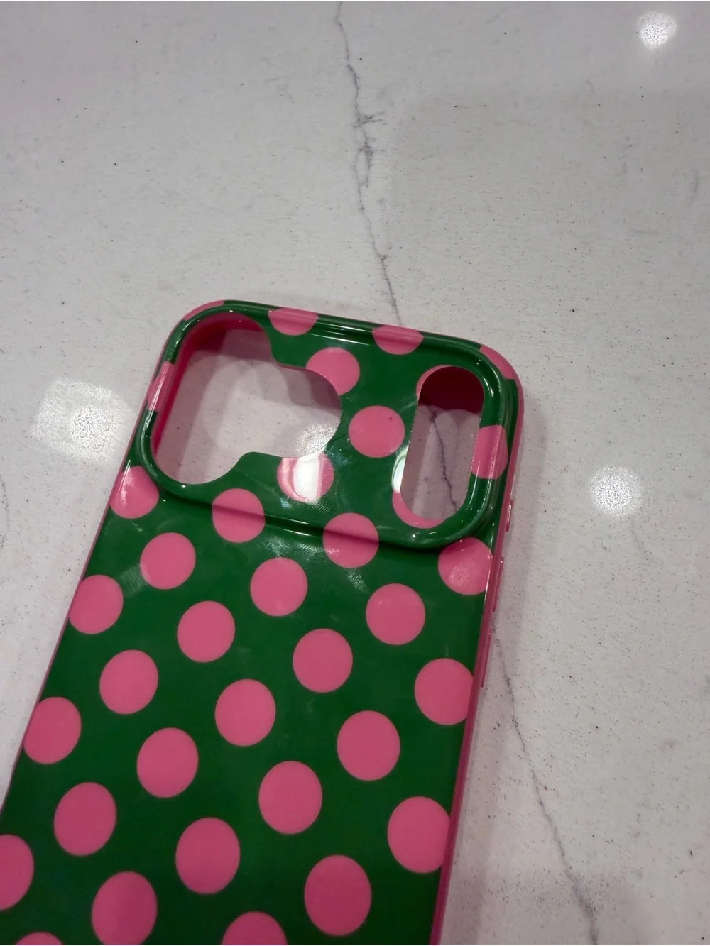 Kate Spade New York green and pink polka dot case for the iPhone 17 Pro Max